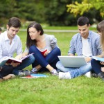 Group-of-Young-People-Studying-in-Park-iStock_000035621698_Large-1024x682